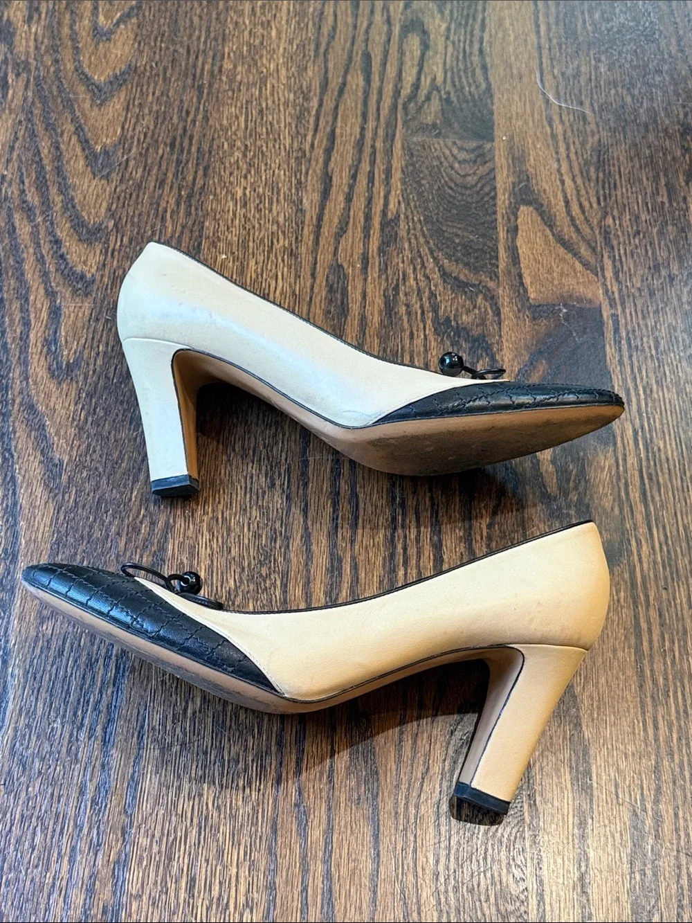 CHANEL Beige and Black Quilted Cap-Toe Bow Pumps size 39